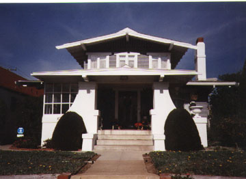 Bungalow with strong Japanese influences, Redondo Beach, CA (1908-1912) features original woodwork and multi-paned windows in sunroom