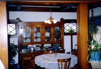 1907 Craftsman-Style home, Fort Dodge, Iowa. Dining room has a warm, cosy feel.